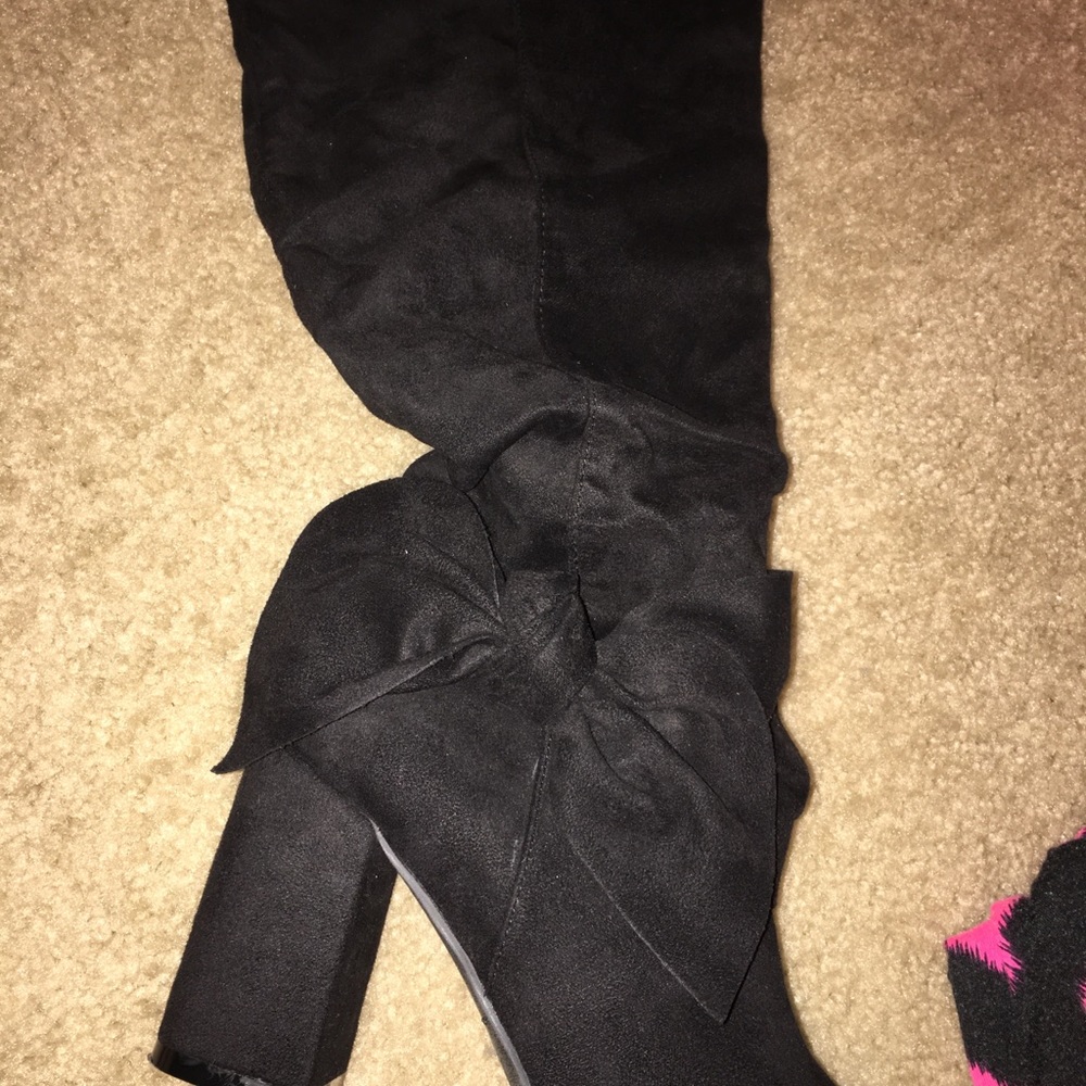 Knee high buckle boots